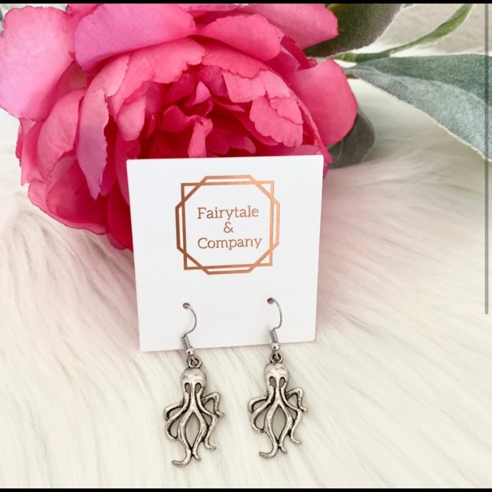 Silver octopus dangle earrings